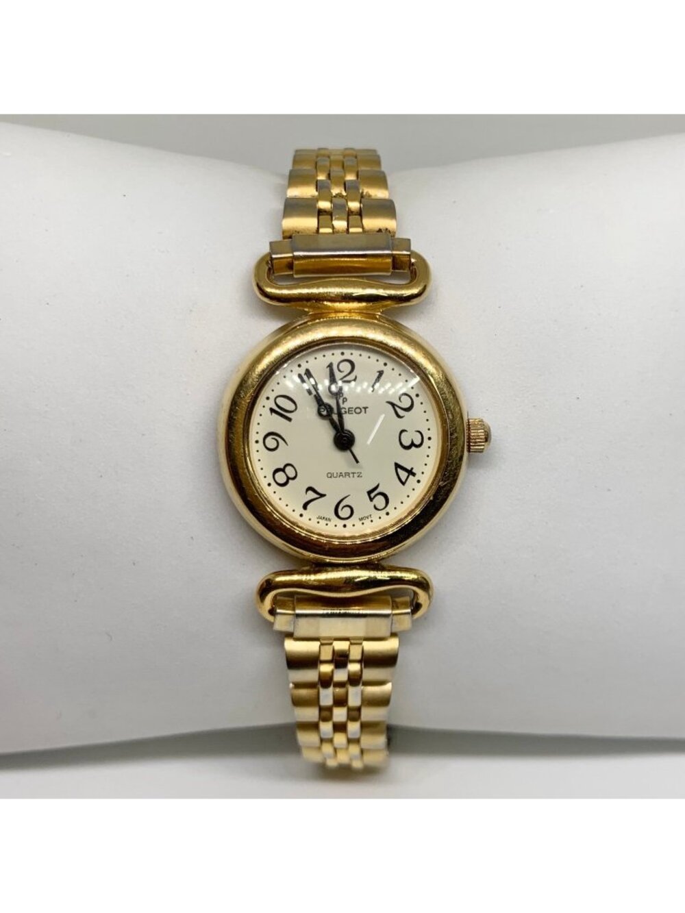 Vintage Peugeot gold tone women’s watch 25mm round quartz up to 7.5” running
